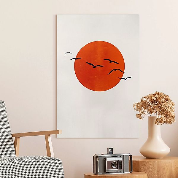 Leinwandbild Vogelschwarm vor roter Sonne I günstig online kaufen