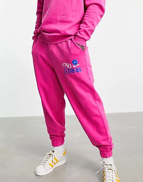 ASOS DESIGN – Oversize-Jogginghose in rosa Acid-Waschung mit Schriftzug, Ko günstig online kaufen