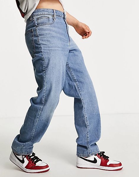 ASOS DESIGN – Weit geschnittene Jeans in mittlerer Vintage-Waschung-Blau günstig online kaufen
