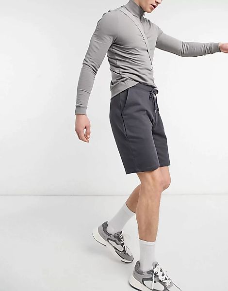 ASOS DESIGN – Schmale Shorts aus Jersey in verwaschenem Schwarz günstig online kaufen