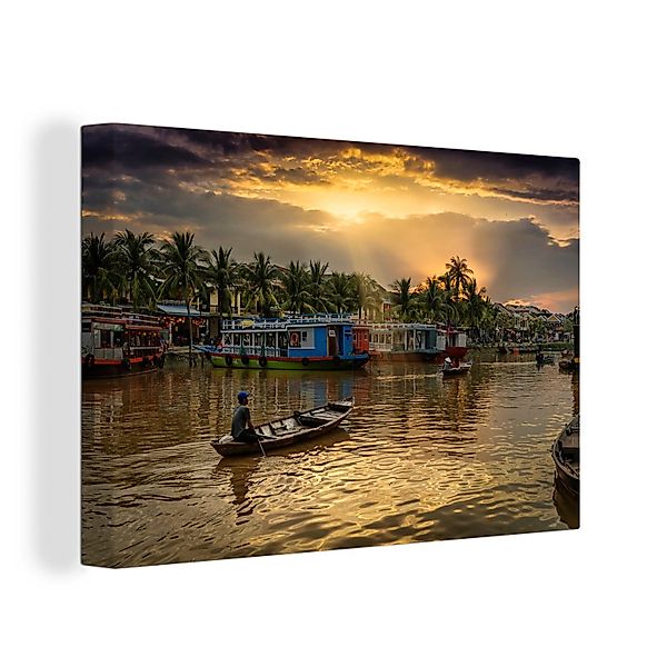 OneMillionCanvasses® Leinwandbild Boot auf dem Thu-Bon-Fluss günstig online kaufen