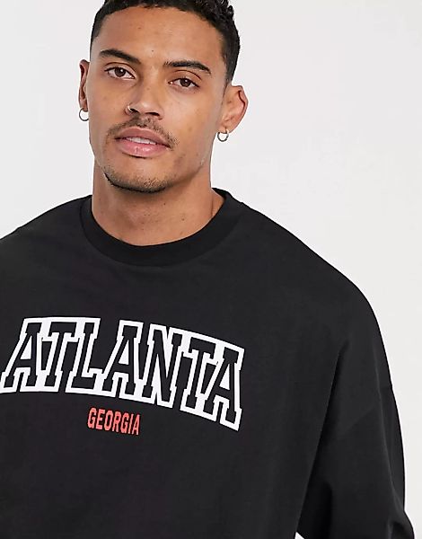 ASOS DESIGN – Langärmliges Oversize-Shirt in Schwarz mit „Atlanta”-Cityprin günstig online kaufen