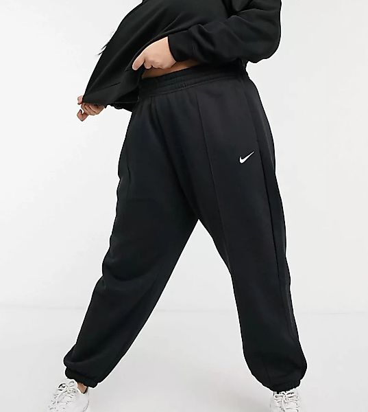 Nike Plus – Oversize-Jogginghose mit kleinem Swoosh-Logo in Schwarz günstig online kaufen