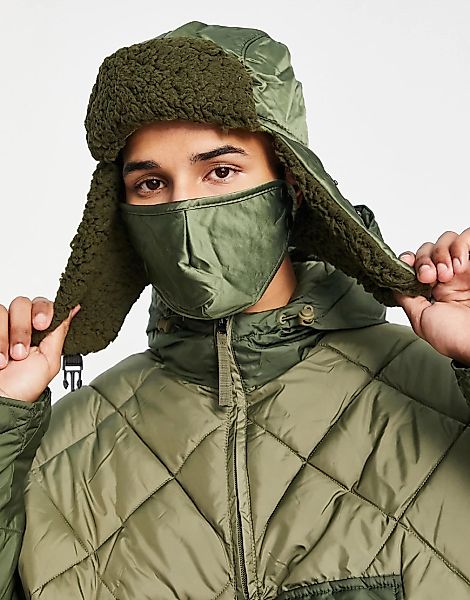 SVNX – Trapper-Mütze in Khaki mit abnehmbarer Maske-Grün günstig online kaufen