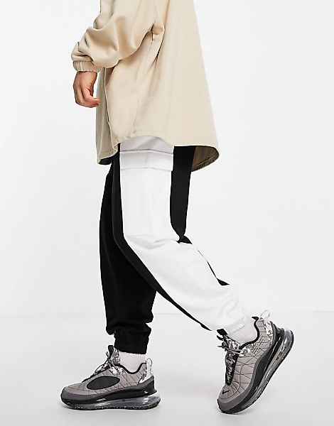 ASOS DESIGN – Oversize-Jogginghose in Schwarz und Weiß mit Blockfarbendesig günstig online kaufen