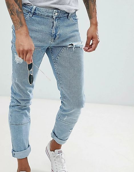 ASOS DESIGN – Enge Jeans in leicht verwaschenem Blau mit eingesetzten Stoff günstig online kaufen