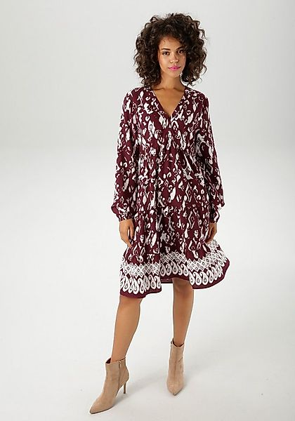 Aniston CASUAL Tunikakleid mit kunstvollem Druck und Bordüre am Saum günstig online kaufen
